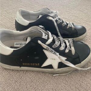 Golden Goose Black and White Vintage Sneakers